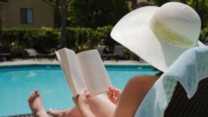 reading by pool large.jpg.653x0_q80_crop-smart