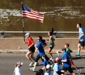 runner-with-flag-300x263